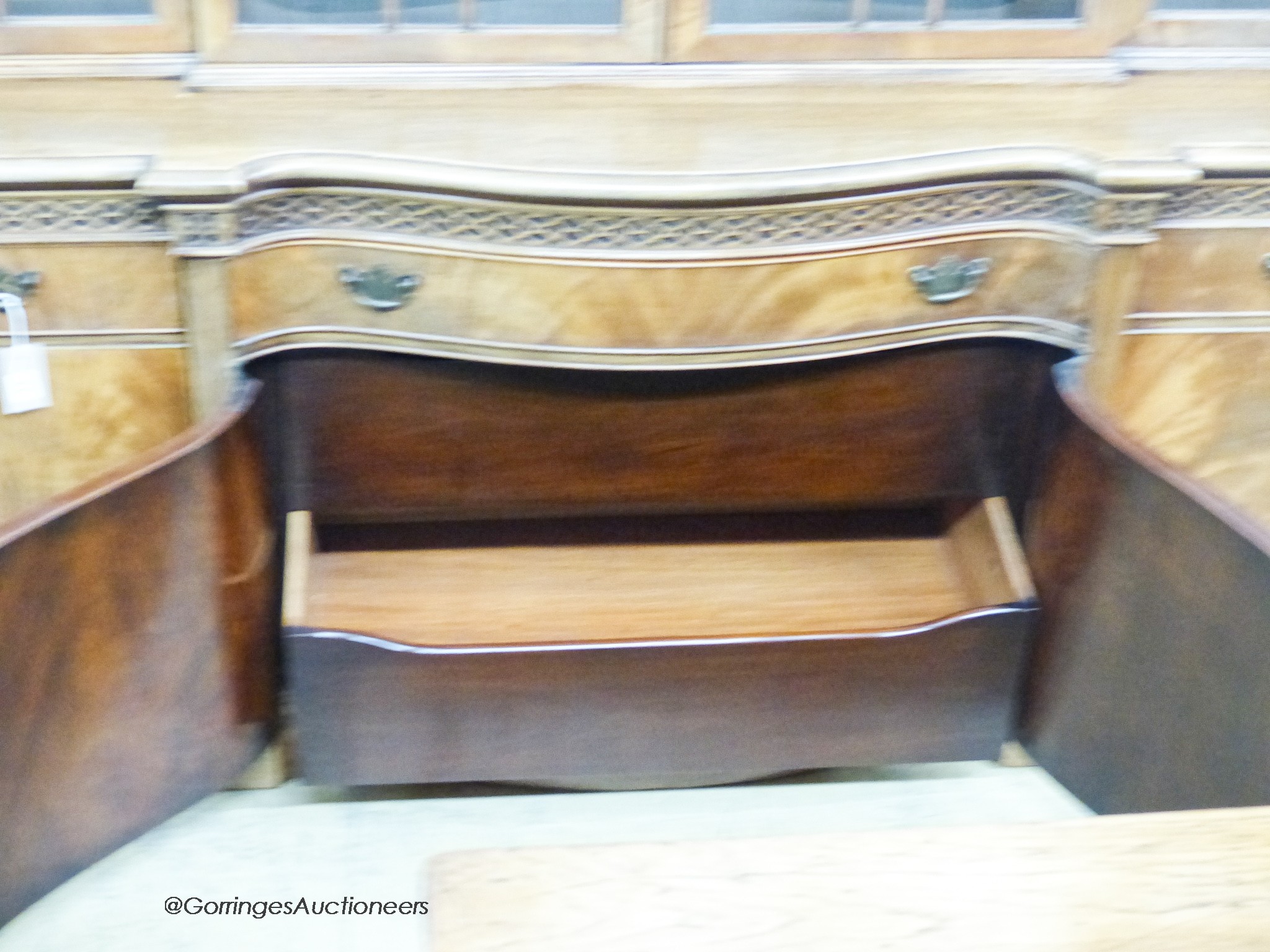 A Georgian style mahogany serpentine front library bookcase, width 160cm, depth 50cm, height 198cm